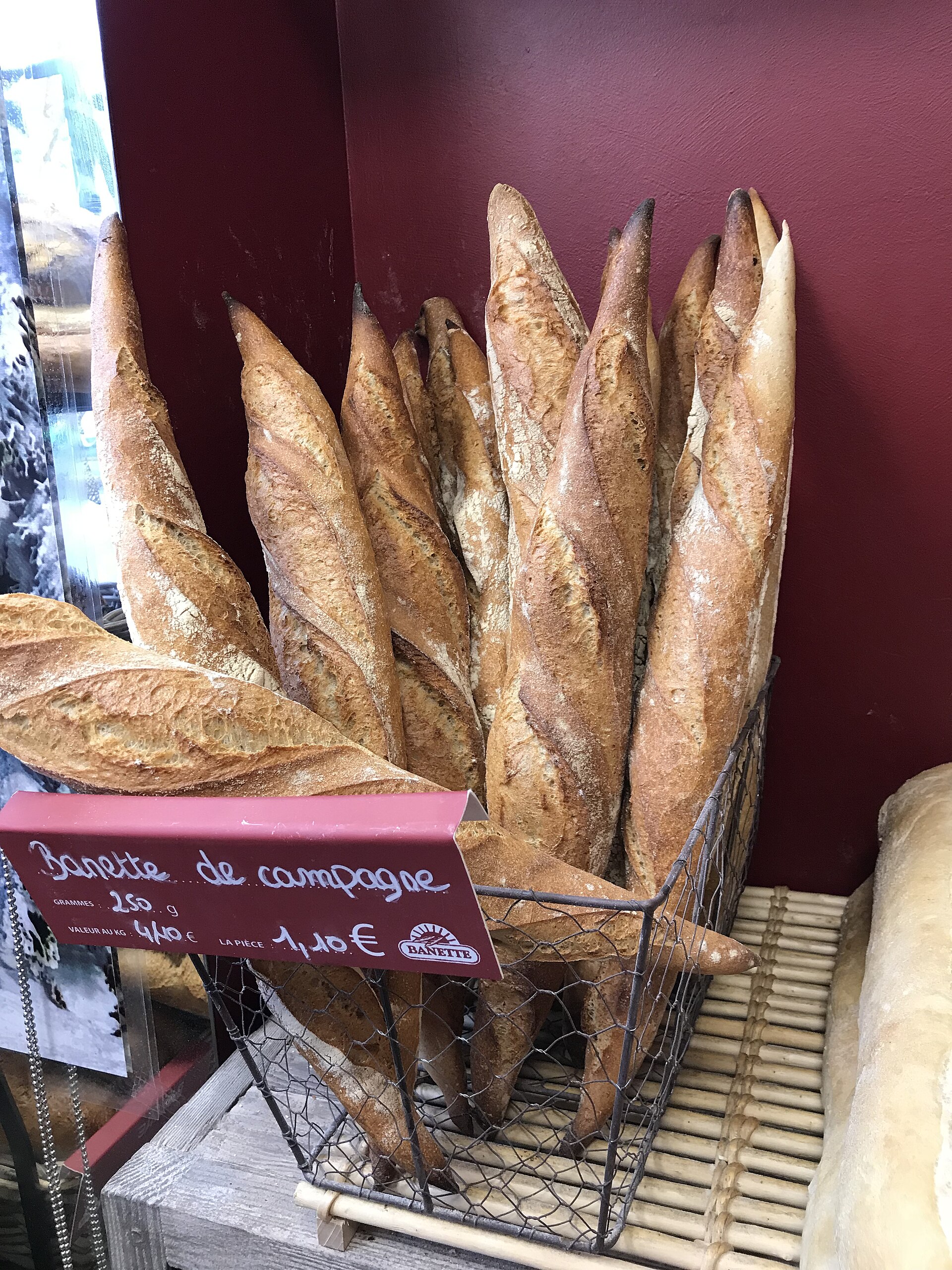Baguettes on display in a French boulangerie