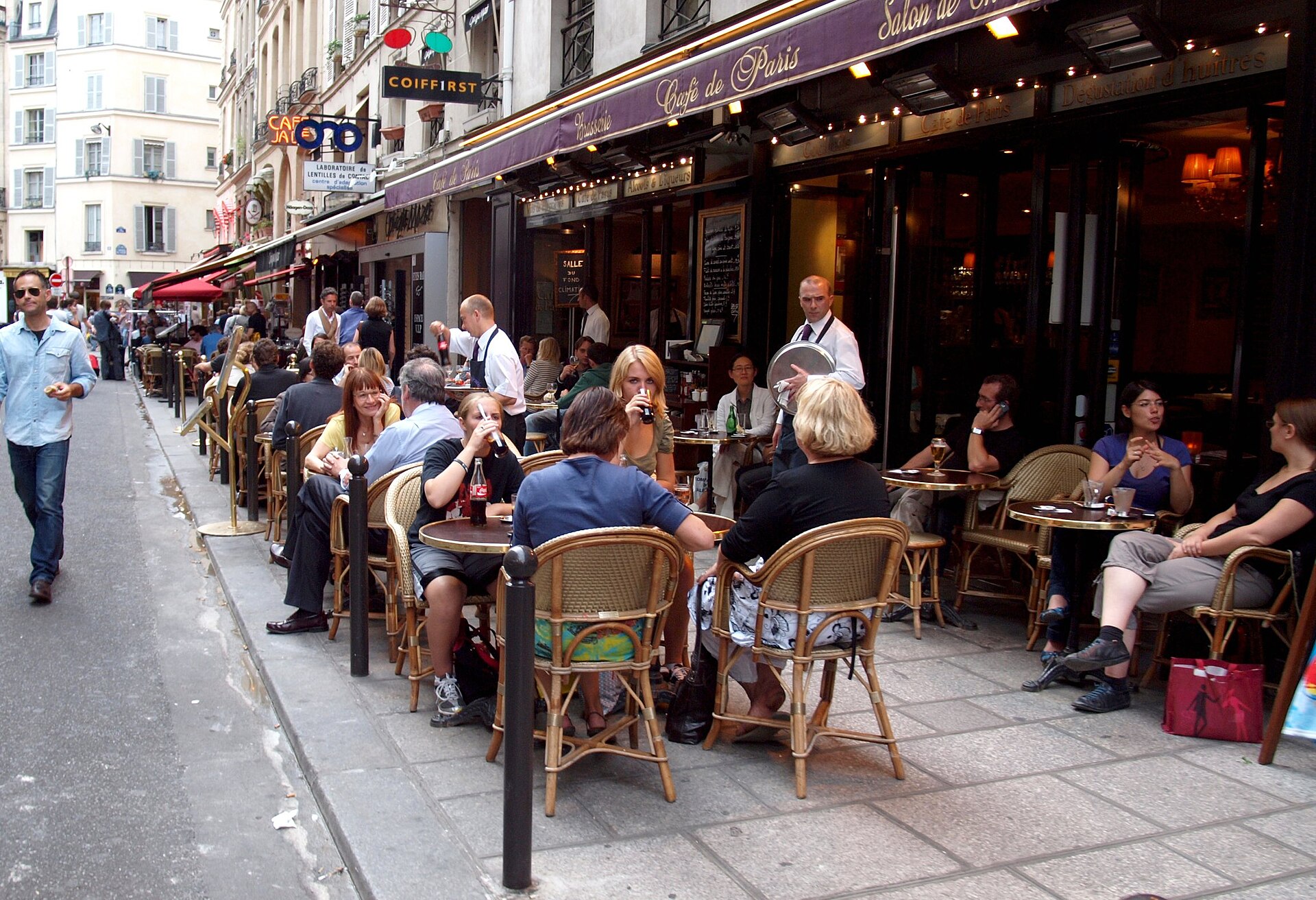 Café terrace on Rue de Buci in the Latin Quarter, Paris